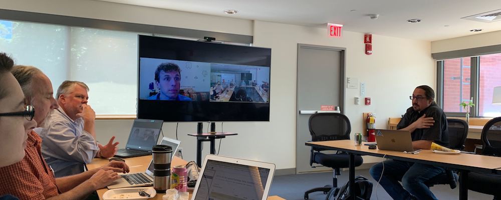 People sitting around a conference table