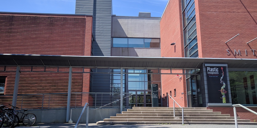 Two-story building with glass entry