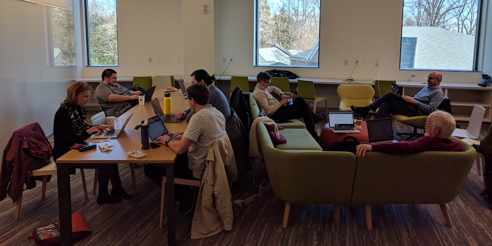 People sitting around tables